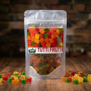 Tutti frutti colorful candied papaya cubes in resealable pouch for baking and desserts